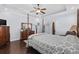 Large main bedroom featuring a tray ceiling, hardwood floors and ample natural light at 200 Stonefly Ct., Murrells Inlet, SC 29576