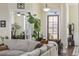 Home Foyer featuring hardwood floors, a decorative light fixture, large potted plants, and white trim at 200 Stonefly Ct., Murrells Inlet, SC 29576