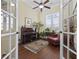 Inviting home office with hardwood floors, large windows, and a cozy reading nook at 200 Stonefly Ct., Murrells Inlet, SC 29576
