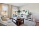 Comfortable living room with sliding glass doors and stylish decor, complete with a couch and coffee table at 2107 Victory Way # 496, Myrtle Beach, SC 29579
