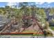 View of the lot surrounded by trees, offering a private setting for building with room to grow at 2208 Bentbill Circle, North Myrtle Beach, SC 29582
