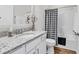 Well-lit bathroom with granite countertops, white cabinets, and a shower-tub combination at 240 Hillsborough Dr., Conway, SC 29526