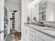 Bright bathroom offers double sinks with granite counters, and a walk-in closet, providing ample space and storage at 240 Hillsborough Dr., Conway, SC 29526