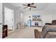 Cozy bonus room with plush seating, TV, and ceiling fan at 240 Hillsborough Dr., Conway, SC 29526