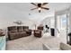Spacious bonus room featuring a comfortable reclining sofa, with space for work or play at 240 Hillsborough Dr., Conway, SC 29526