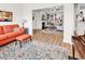 Open-concept living room with fireplace, light-filled sitting area, and seamless flow at 240 Hillsborough Dr., Conway, SC 29526