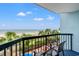 Picturesque ocean view from the balcony with comfortable seating and palm trees swaying in the breeze at 2401 S Ocean Blvd. S # 267, Myrtle Beach, SC 29577