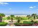 Amazing beach view from condo featuring palm trees, walkway to the sand, and ocean views at 2401 S Ocean Blvd. S # 267, Myrtle Beach, SC 29577
