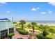 Beautiful beach view from the condo, with a path to the sand and palm trees at 2401 S Ocean Blvd. S # 267, Myrtle Beach, SC 29577