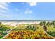 Picturesque beach view with vibrant floral landscaping, offering a serene and inviting scene at 2401 S Ocean Blvd. S # 267, Myrtle Beach, SC 29577