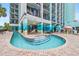 Multi-level pool with seating and steps, offering a relaxing experience at 2401 S Ocean Blvd. S # 267, Myrtle Beach, SC 29577