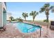 Beautiful pool area with brick surround, palm trees, and convenient access to the nearby beach at 2401 S Ocean Blvd. S # 267, Myrtle Beach, SC 29577