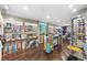 Brightly lit retail space with shelves stocked with merchandise and a wooden floor at 2401 S Ocean Blvd. S # 267, Myrtle Beach, SC 29577