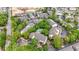 Aerial view showcases the community layout with lush landscaping, a central pool, and ample parking at 250 Maison Dr. # J-11, Myrtle Beach, SC 29572