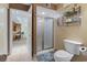 Bathroom with a glass enclosed shower and shelving for decor at 250 Maison Dr. # J-11, Myrtle Beach, SC 29572
