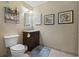 Comfortable half bathroom showcasing a vanity, toilet, and decor at 250 Maison Dr. # J-11, Myrtle Beach, SC 29572