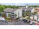 Exterior view of condominium building with landscaping, parking lot and construction area at 250 Maison Dr. # J-11, Myrtle Beach, SC 29572