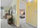 Hallway leading to a bedroom with a view of the bed and a sitting area off to the left at 250 Maison Dr. # J-11, Myrtle Beach, SC 29572