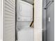 Stacked white washer and dryer unit inside a closet at 2504 N Ocean Blvd. # 934, Myrtle Beach, SC 29577