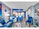 A view of the condo living room showing the kitchen area, seating, and coastal accents at 2504 N Ocean Blvd. # 934, Myrtle Beach, SC 29577
