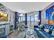 Stylish living room with nautical accents, balcony access, and ocean views, complemented by comfortable seating and modern decor at 2504 N Ocean Blvd. # 934, Myrtle Beach, SC 29577
