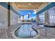 Indoor pool area with two pools, lounge chairs, and palm tree views at 2504 N Ocean Blvd. # 934, Myrtle Beach, SC 29577