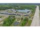 High aerial view showing the neighborhood's layout near the highway and a pond at 291 Brackish Dr. # 291, Myrtle Beach, SC 29588