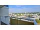 Breathtaking balcony view showcasing neighborhood, tennis courts, and city views at 300 N Ocean Blvd. # 1732, North Myrtle Beach, SC 29582