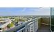 Breathtaking balcony view showcasing lush landscaping, condos, and city views at 300 N Ocean Blvd. # 1732, North Myrtle Beach, SC 29582