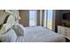 Comfortable bedroom with a queen bed, balcony, and lots of natural light at 300 N Ocean Blvd. # 1732, North Myrtle Beach, SC 29582