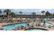 Relaxing pool area showcasing lounge chairs and lush palm trees for ultimate vacation vibes at 300 N Ocean Blvd. # 1732, North Myrtle Beach, SC 29582