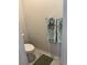A view of the toilet and towel rack in the bathroom at 3019 Visionary Dr., Myrtle Beach, SC 29588