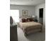 Bedroom with warm toned decor and a sunny window at 3019 Visionary Dr., Myrtle Beach, SC 29588