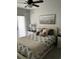 Cozy bedroom features a neutral color palette, soft textures, and plenty of natural light at 3019 Visionary Dr., Myrtle Beach, SC 29588