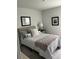 Bedroom with patterned bedding and soft decor at 3019 Visionary Dr., Myrtle Beach, SC 29588