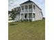 Charming two-story home with double porch and green lawn, offering great curb appeal at 3019 Visionary Dr., Myrtle Beach, SC 29588