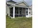 Exterior shot of the home and screened in patio at 3019 Visionary Dr., Myrtle Beach, SC 29588