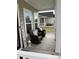 Relaxing front porch featuring wicker chairs, throw pillows, and a welcoming decor at 3019 Visionary Dr., Myrtle Beach, SC 29588