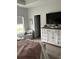 Well-appointed main bedroom showcasing stylish furniture, decor, and a comfortable sitting area at 3019 Visionary Dr., Myrtle Beach, SC 29588