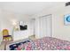 Bright bedroom featuring a queen size bed with closet and furniture at 311 71St Ave. N # 3-D, Myrtle Beach, SC 29572