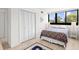 Comfortable bedroom with a queen size bed, ample natural light, and a closet at 311 71St Ave. N # 3-D, Myrtle Beach, SC 29572