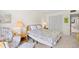Relaxing main bedroom with soft lighting and comfortable seating is the perfect place to unwind at 311 71St Ave. N # 3-D, Myrtle Beach, SC 29572