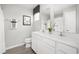 Elegant bathroom featuring double vanity sinks, modern fixtures, and neutral tones for a spa-like feel at 3208 Nw Edgemead Circle # B, Calabash, NC 28467