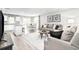 Inviting living room open to dining with neutral palette, modern furnishings, and lots of light at 3208 Nw Edgemead Circle # B, Calabash, NC 28467