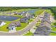 An aerial view of homes in a picturesque neighborhood featuring ponds and mature trees at 3332 Little Bay Dr., Conway, SC 29526