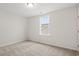 Well-lit bedroom with plush carpet, a window for natural light, and neutral paint creating a calm space at 3332 Little Bay Dr., Conway, SC 29526
