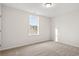 Bright bedroom with a window, neutral walls, and plush carpeting, creating a serene atmosphere at 3332 Little Bay Dr., Conway, SC 29526