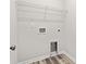 A utility room featuring laundry hookups, storage shelving, and trim at 3332 Little Bay Dr., Conway, SC 29526