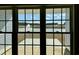 Scenic view of a lake with a fountain from a large window at 3332 Little Bay Dr., Conway, SC 29526