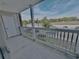 Balcony with white railings, offering an outdoor space and view of the parking area at 3762 Citation Way # 1022, Myrtle Beach, SC 29572